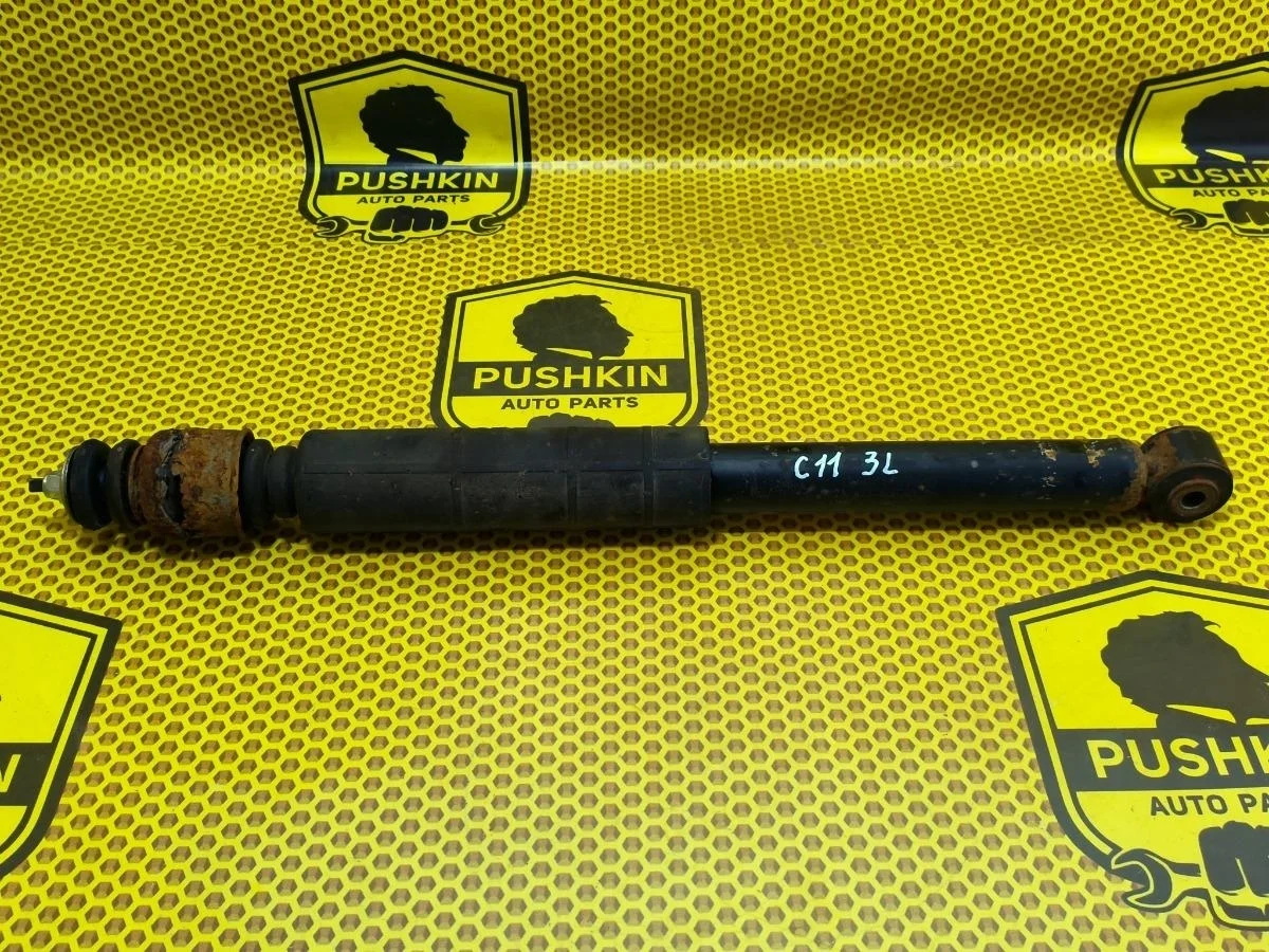 Амортизатор подвески Nissan Tiida 2008 E6210EC80A C11 HR16DE, задний левый