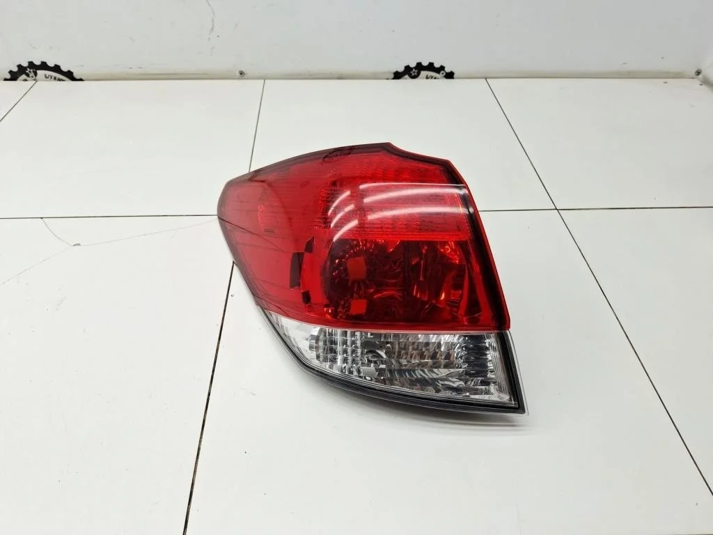 Фонарь задний наружный левый Subaru Outback B14, BR