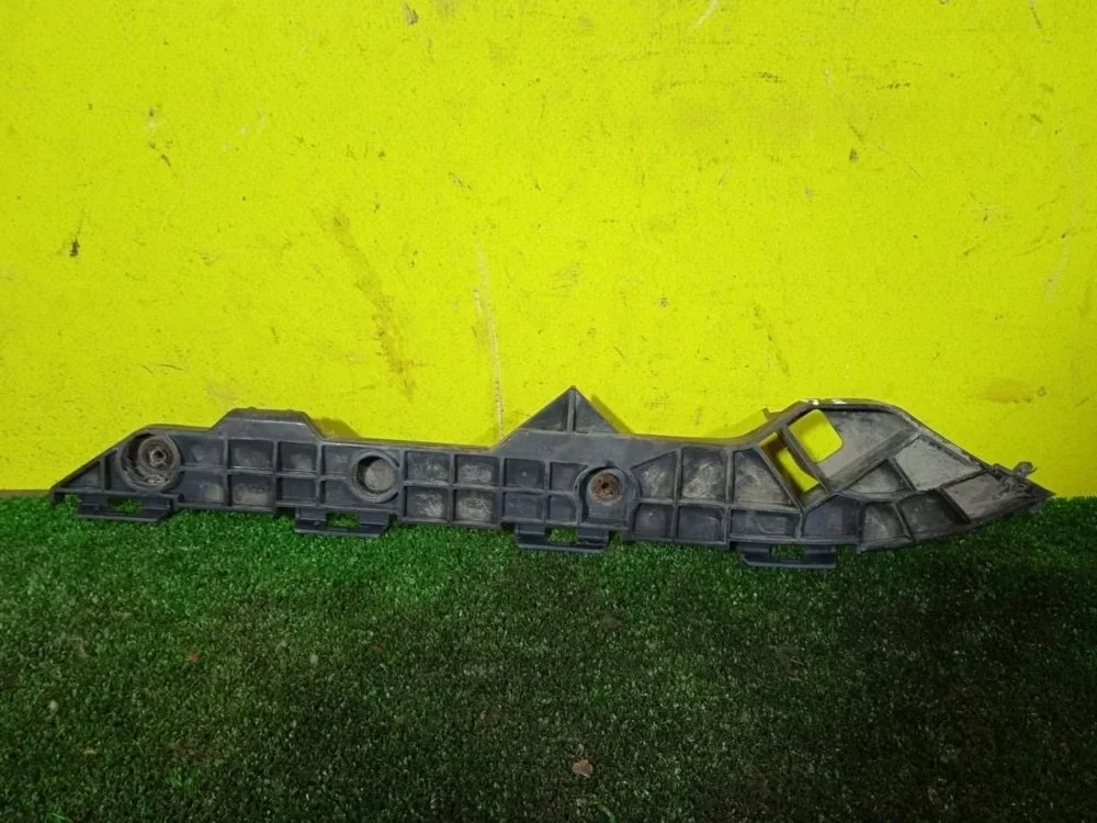 Кронштейн бампера Toyota Corolla 2010 5215612290 150 1ZRFE, задний левый