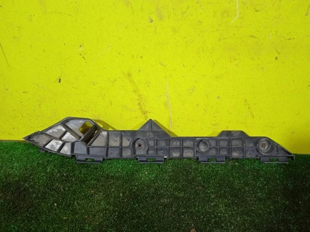 Кронштейн бампера Toyota Corolla 2010 5215512320 150 1ZRFE, задний правый