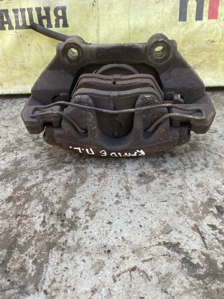 Суппорт Skoda Rapid 2014 1K0615123E CAXA, передний левый