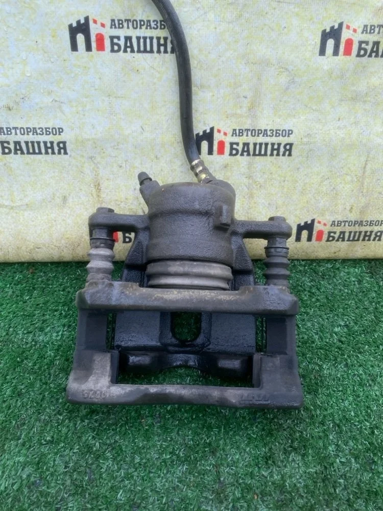 Суппорт Nissan Almera 2014 4101100Q0F G15 K4M, передний левый