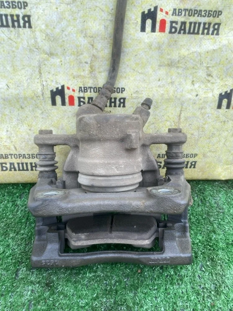 Суппорт Nissan Almera 2014 4100100Q0F G15 K4M, передний правый