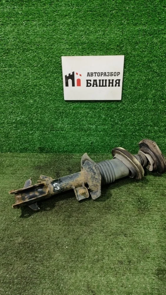 Амортизатор Nissan Tiida 2010 E4303EC80A C11 HR16DE, передний левый