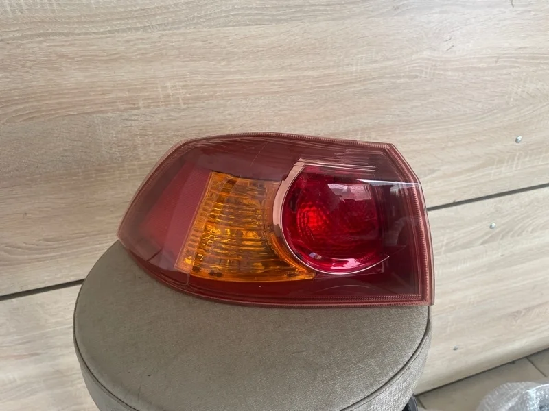 ФОНАРЬ В КРЫЛО MITSUBISHI LANCER 10 2007 8330A109 CY1A 4A91, задний левый