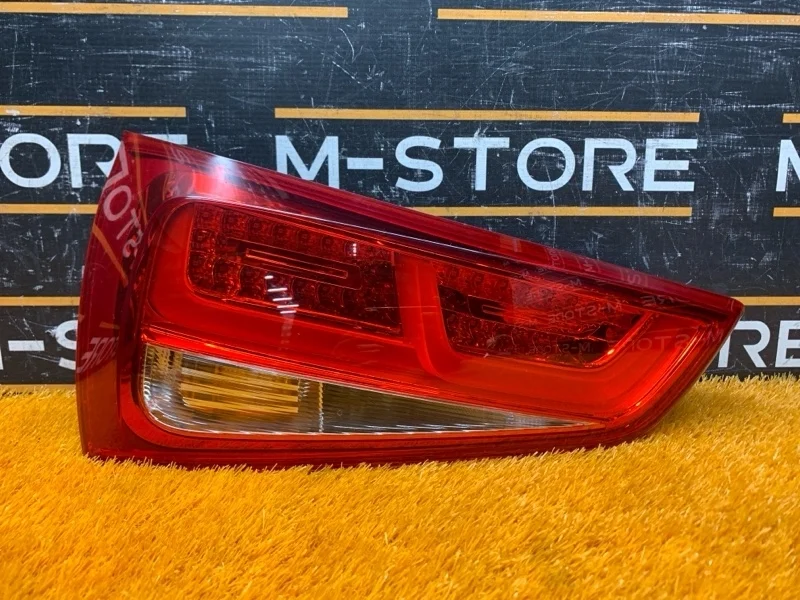 Фонарь крышки багажника Audi A1 2011 8X0945093B 8X CAX, левый