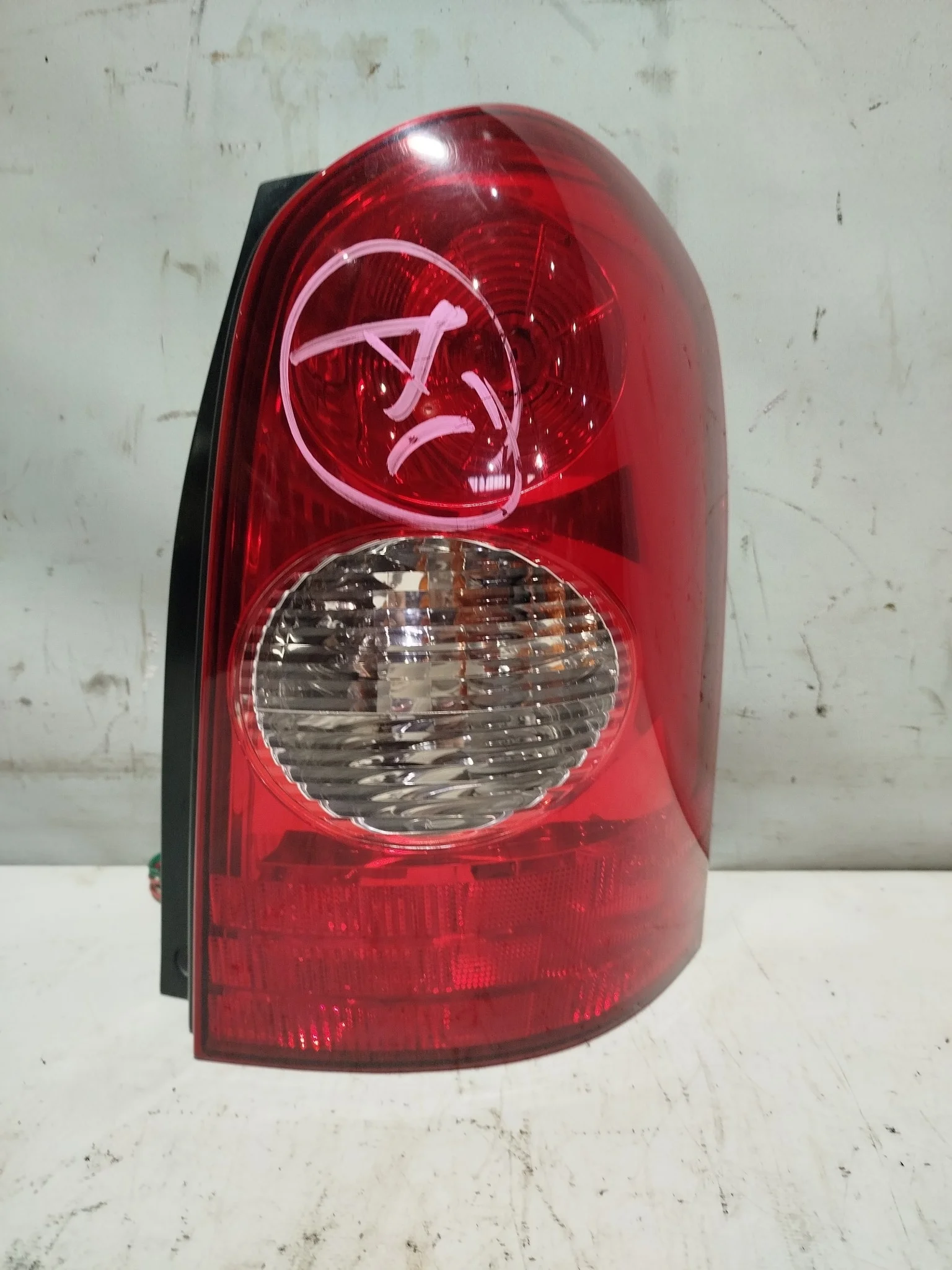 ФОНАРЬ MAZDA ПРАВО L12051150B NA8246