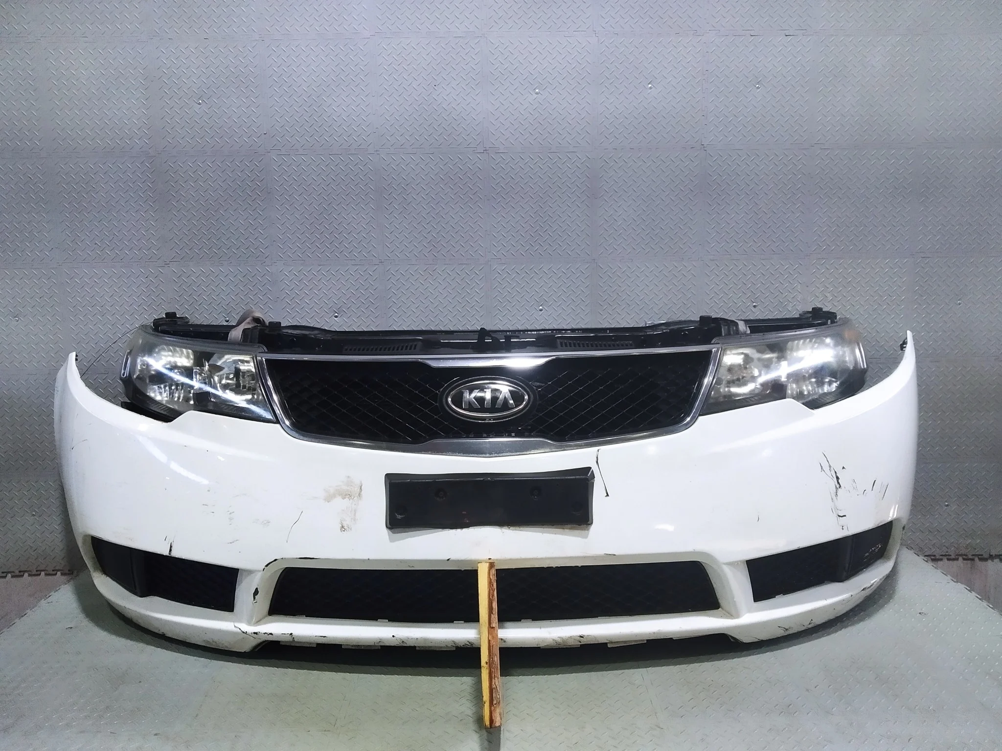 NOSECUT KIA 865111M000 белый DY805