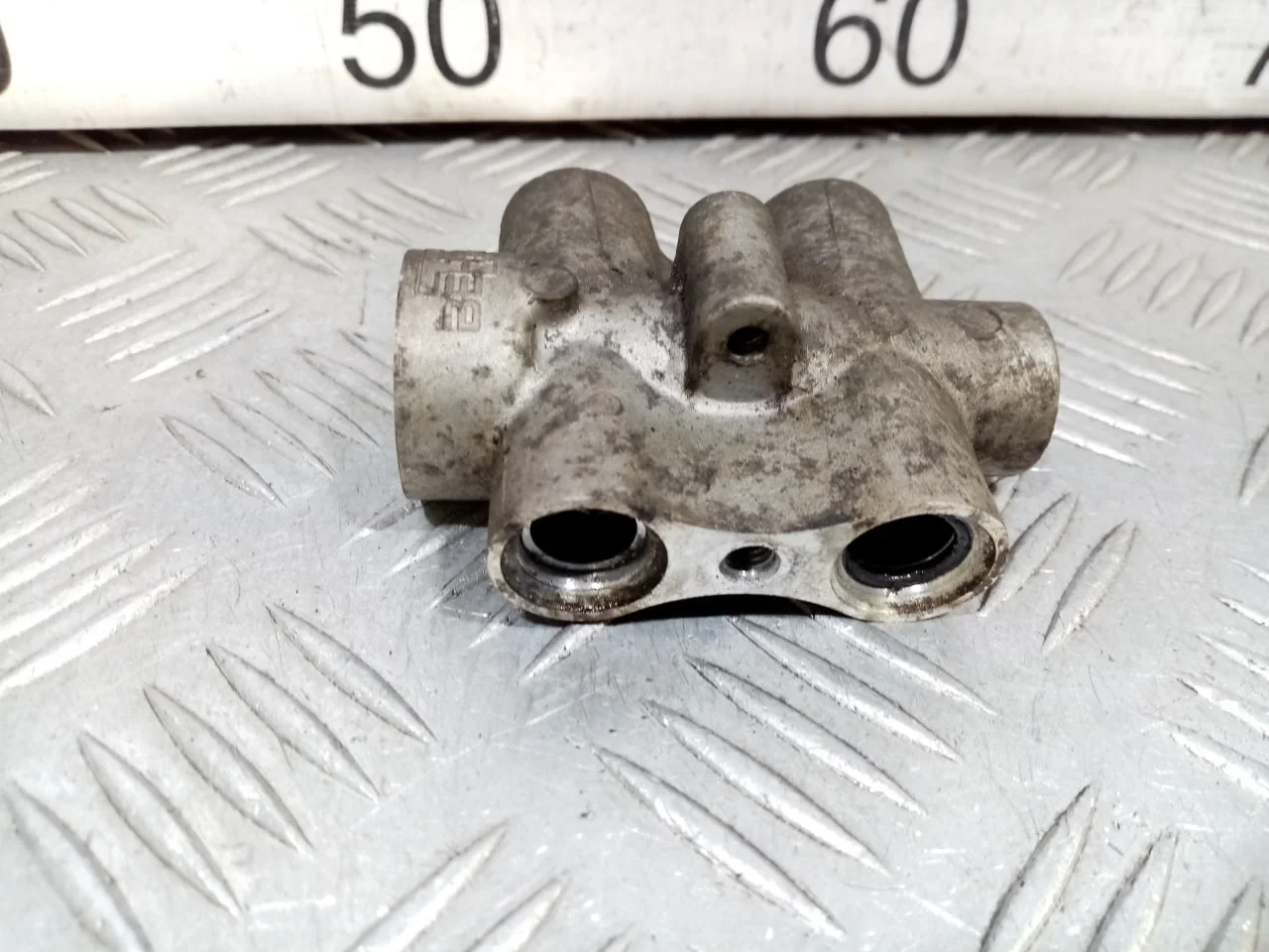 [ЧАСТЬ Б/У] Радиатор (маслоохладитель) АКПП Touareg - (Состояние: только термостат ) [Код: 00534070 ]