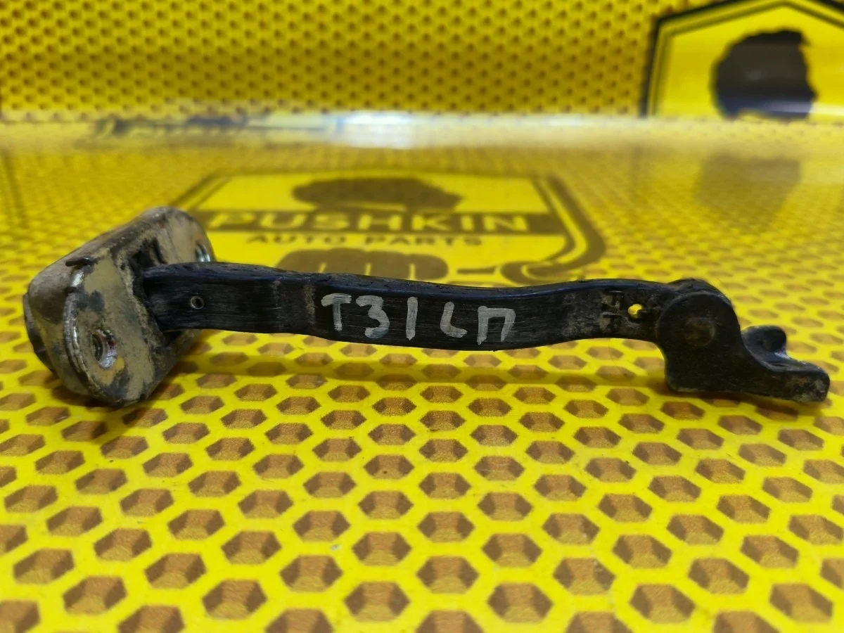 Ограничитель двери Nissan X-TRAIL 2012 80430JG000 T31 M9R, передний левый