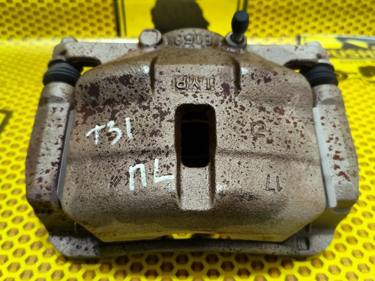 Суппорт Nissan X-TRAIL 2012 41011JD00A T31 M9R, передний левый