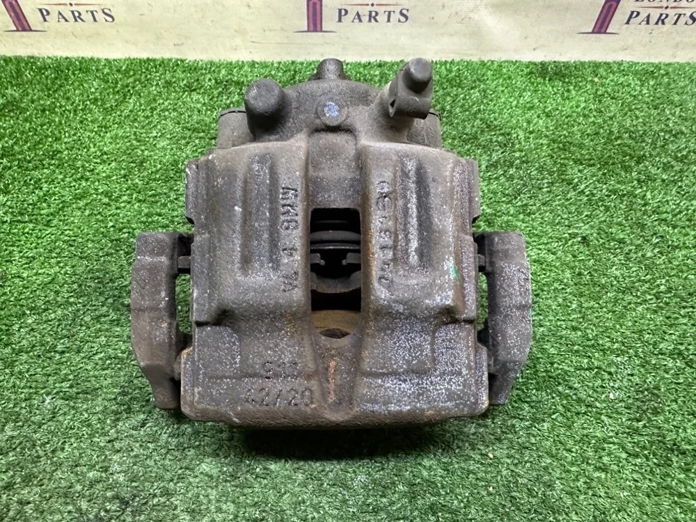 Суппорт тормозной BMW 320i E90