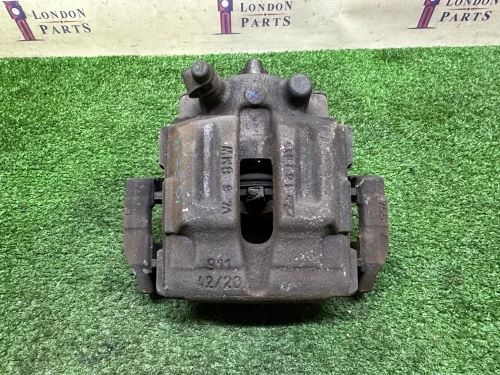 Суппорт тормозной BMW 320i E90