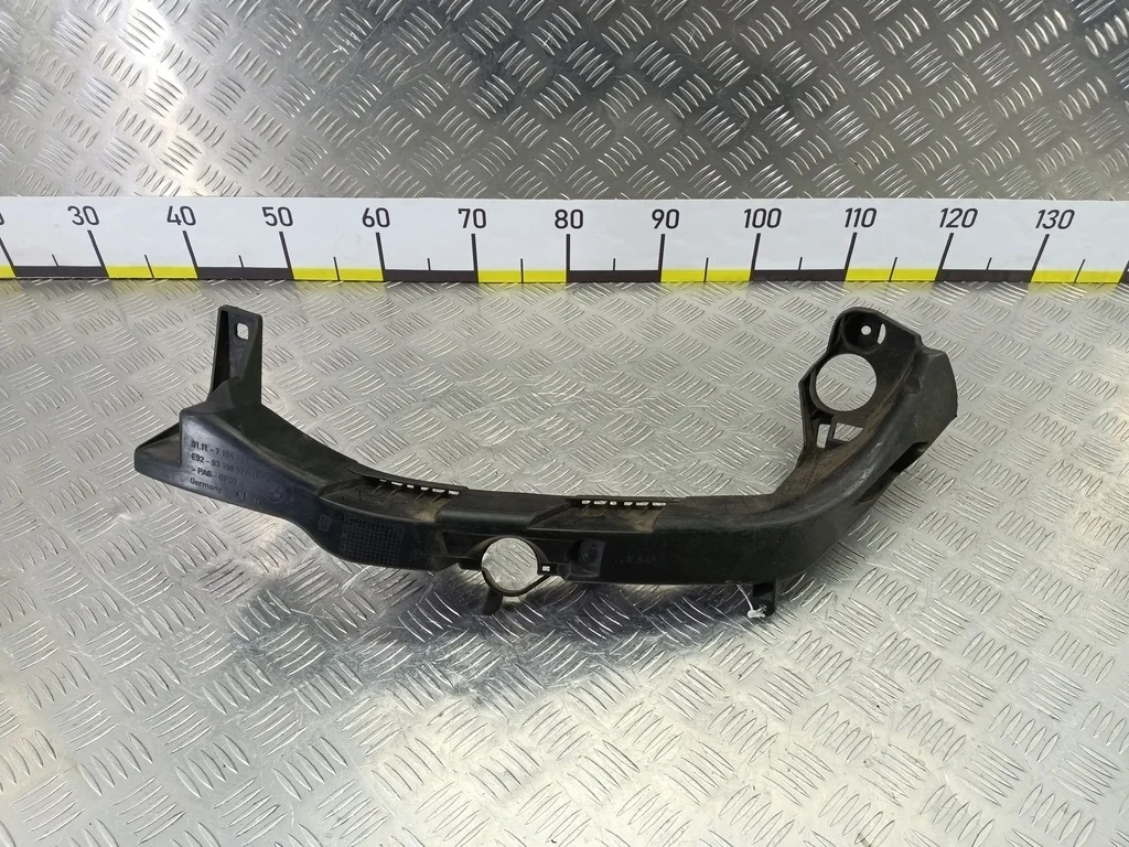 Кронштейн фары левой BMW