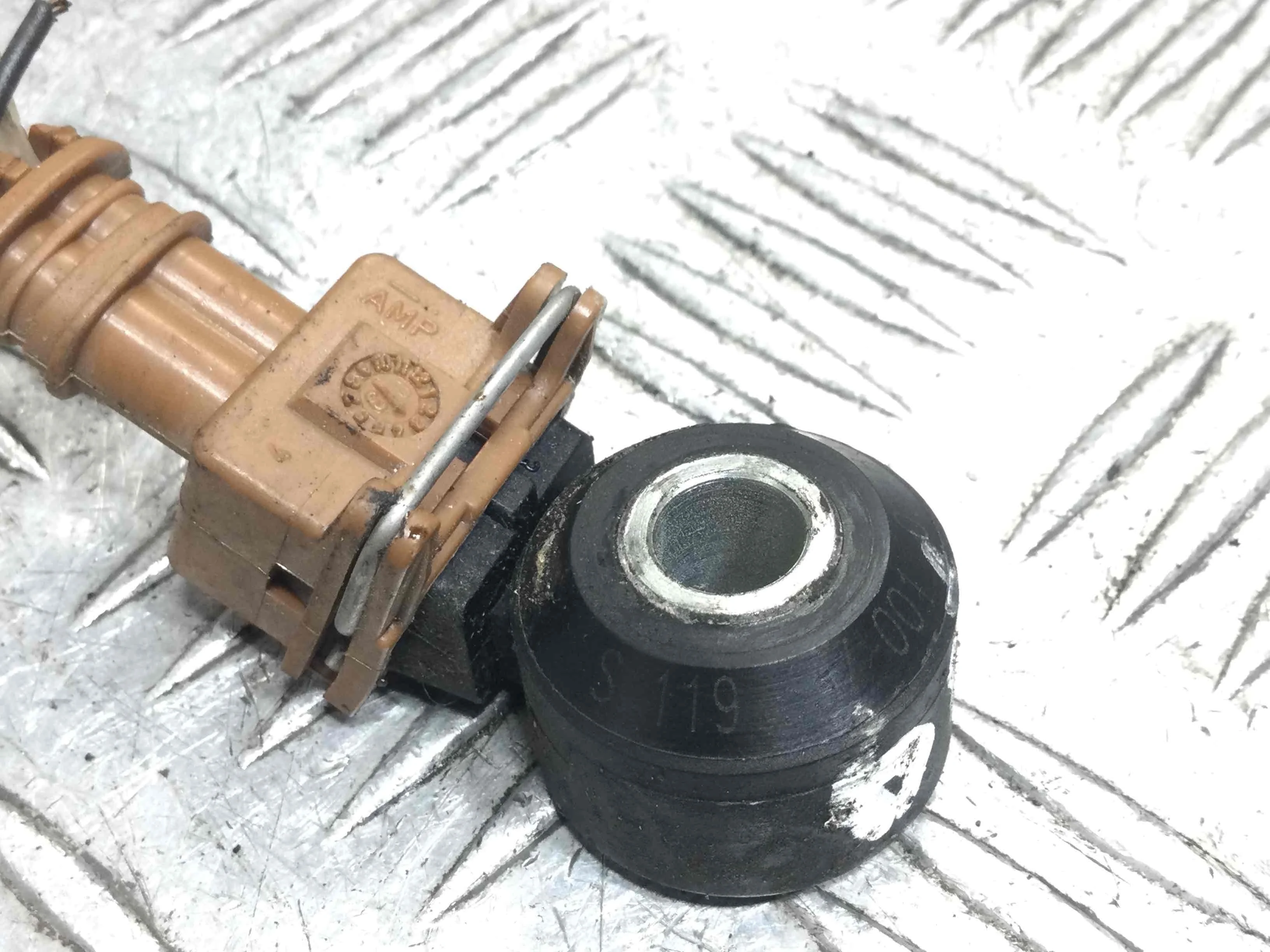 Датчик детонации Nissan Micra K12 (2002-2010) бензин 1.2  Механика Х/б