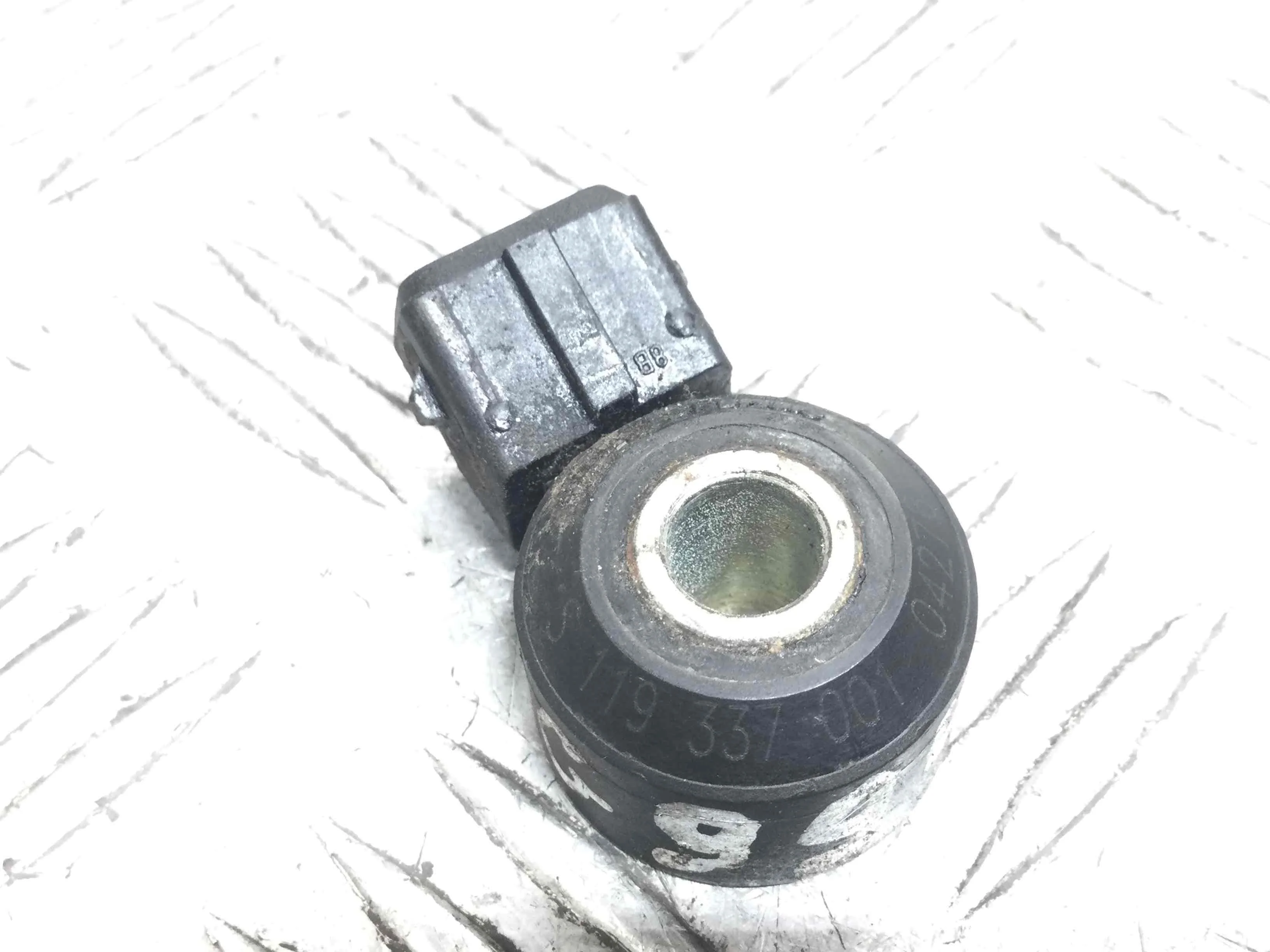 Датчик детонации Nissan Micra K12 (2002-2010) бензин 1.2 i Механика Х/б