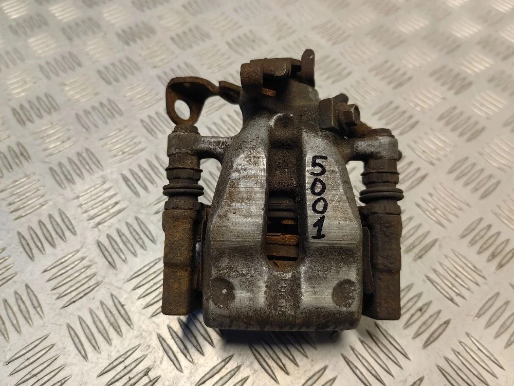 Суппорт задний правый Opel Astra H