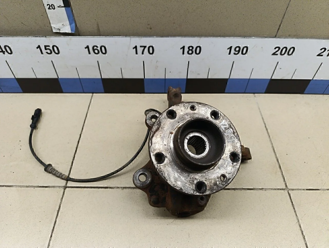 Кулак поворотный передний левый Duster 2012>