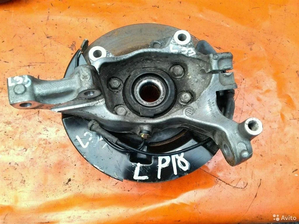 Кулак поворотный передний левый Nissan Teana L33