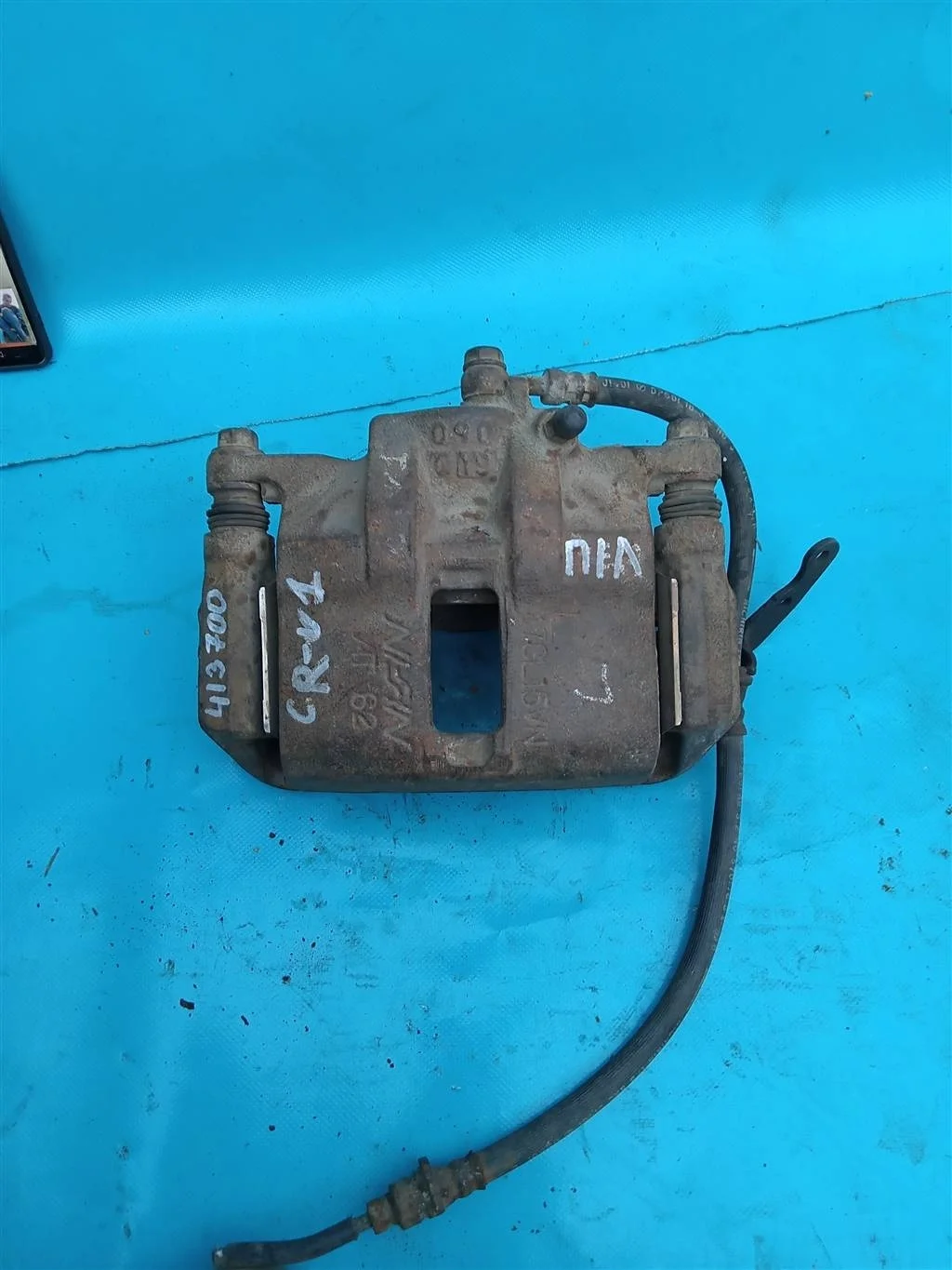 Суппорт тормозной передний левый Honda CR-V 1996-