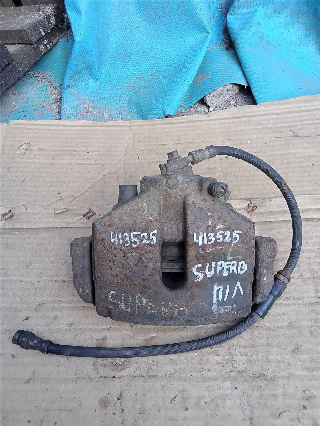 Суппорт тормозной передний левый Skoda Superb 200