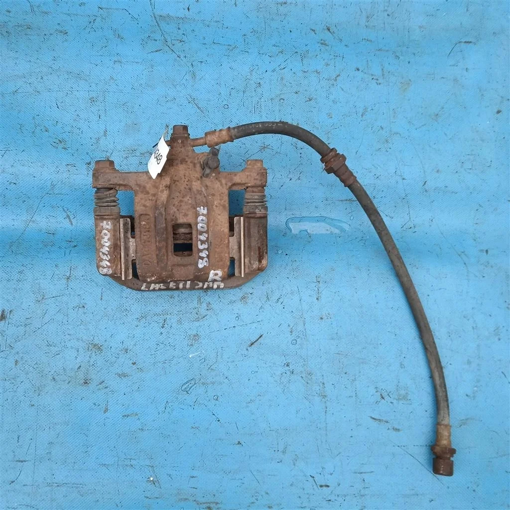 Суппорт тормозной задний правый Chevrolet Lacetti