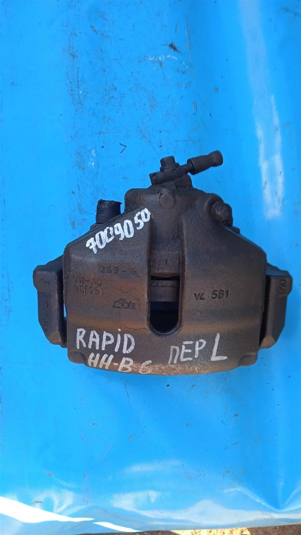 Суппорт тормозной передний левый Skoda Rapid (201