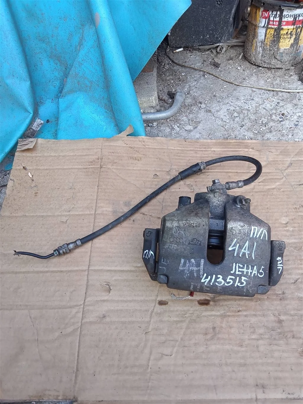 Суппорт тормозной передний левый VW Jetta (2005-2