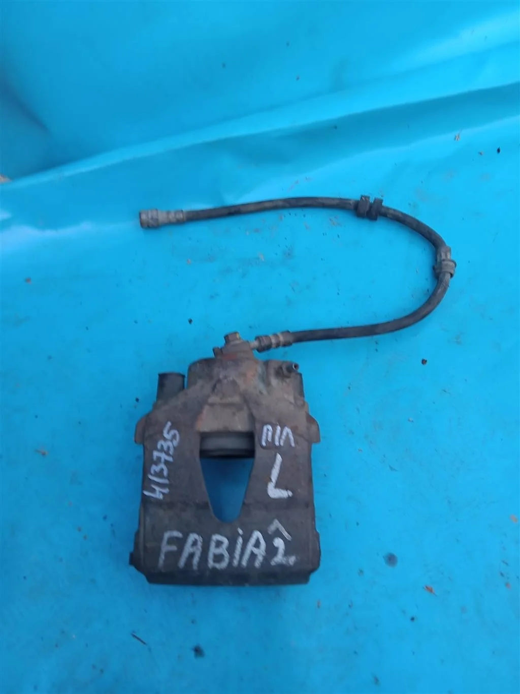 Суппорт тормозной передний левый Skoda Fabia 2 (2