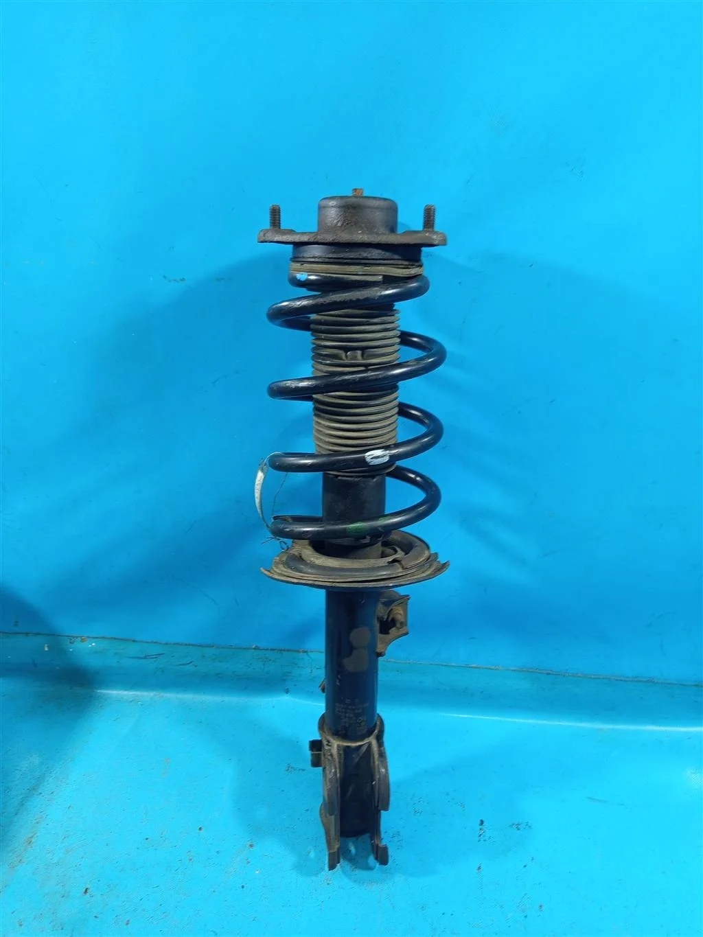 Амортизатор передний левый Kia Sorento XM (2009-2