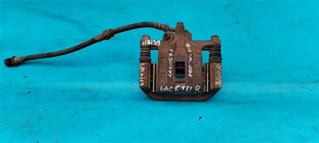 Суппорт тормозной задний правый Chevrolet Lacetti