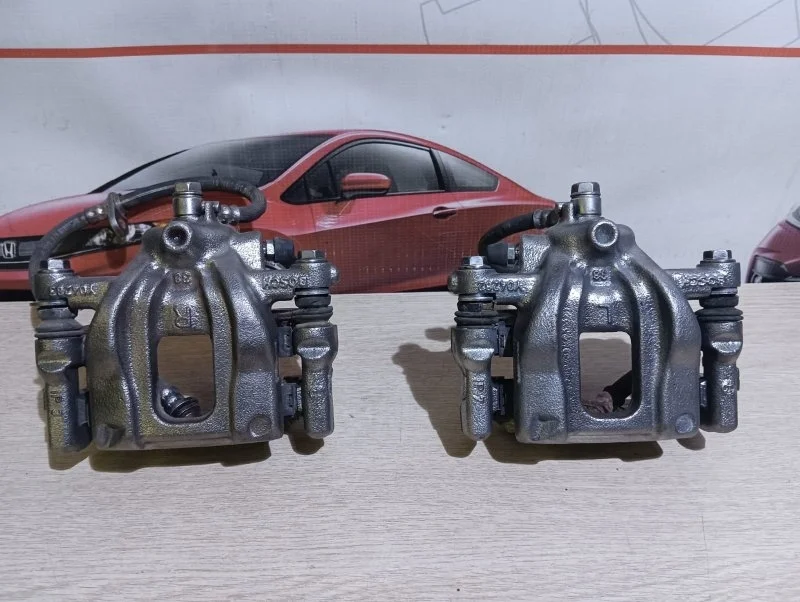 Суппорт тормозной задний Honda CR-V K20A