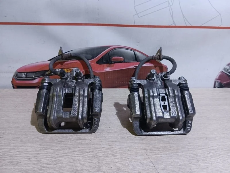 Суппорт тормозной задний Honda CR-V RM K24Z