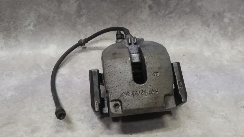 Суппорт тормозной задний левый BMW X5 E70