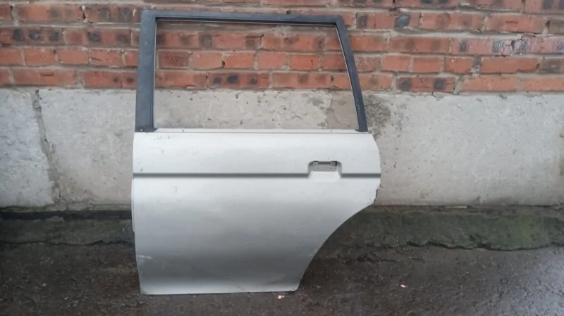 Дверь задняя левая Mitsubishi Pajero Sport K90