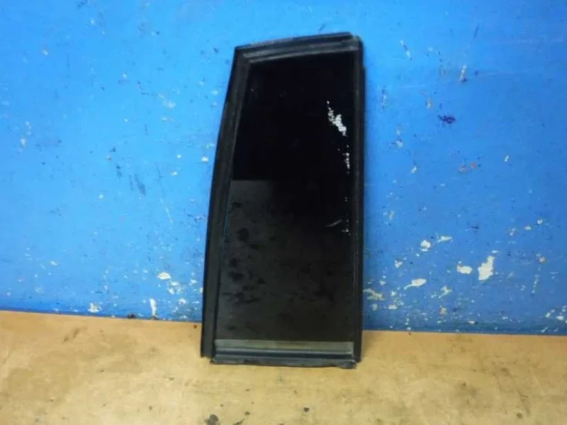 Стекло двери заднее левое Ssang Yong Kyron