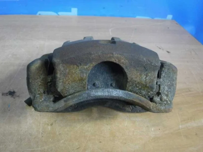 Суппорт тормозной передний правый Kia Rio