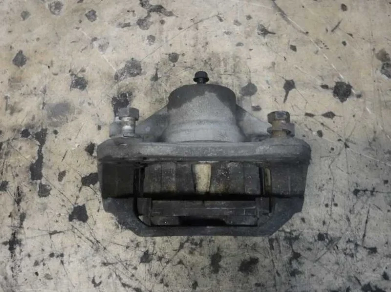 Суппорт тормозной передний левый Kia Ceed