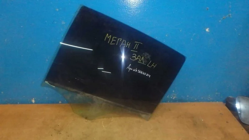 Стекло двери заднее левое Renault Megane 2