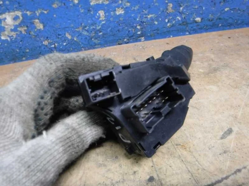 Переключатель поворотов подрулевой Nissan Primera