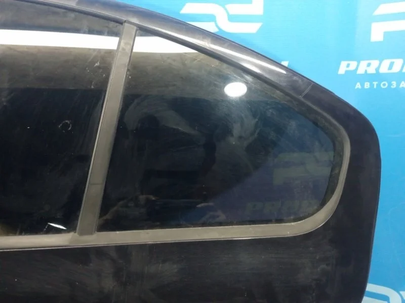 Стекло двери заднее левое Skoda Octavia A5 BSE