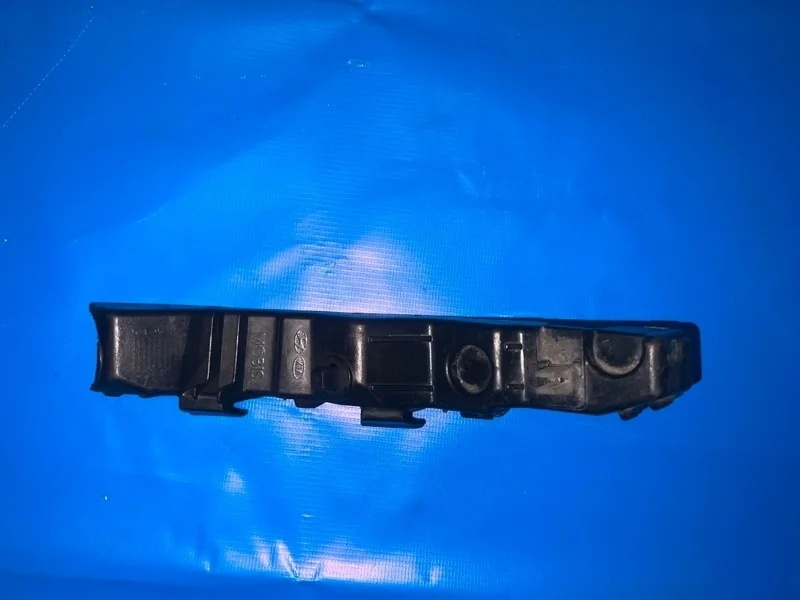 Кронштейн бампера передний левый Kia Sportage