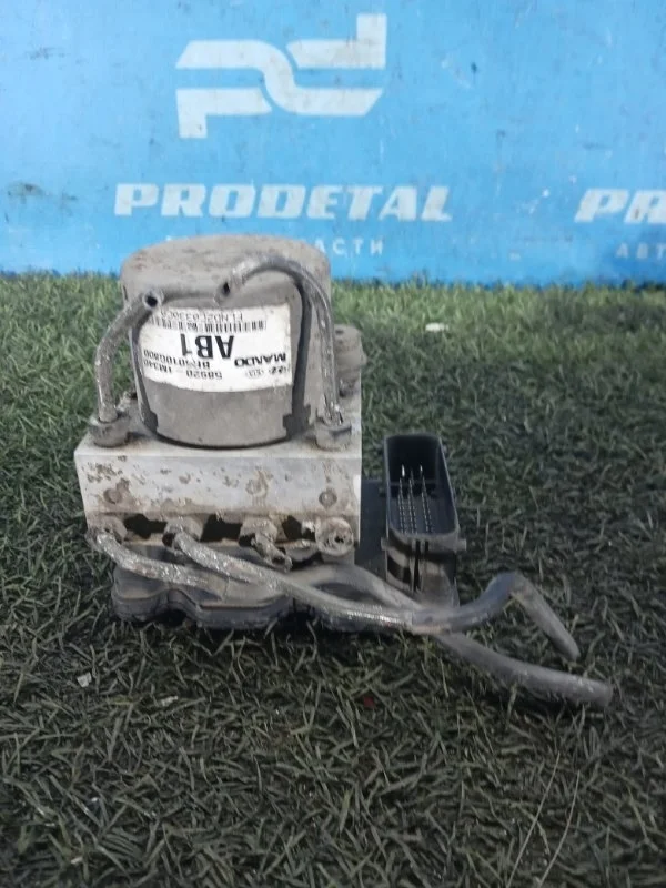 Блок ABS (насос) Kia Cerato 2009-2013