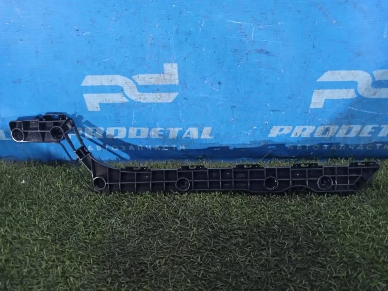 Кронштейн бампера задний правый Toyota Land