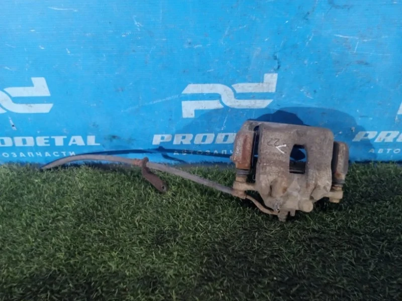 Суппорт тормозной передний левый Kia Rio СЕДАН