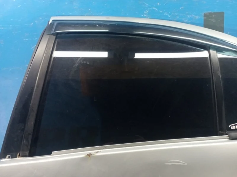 Стекло двери заднее левое Nissan Almera Classic