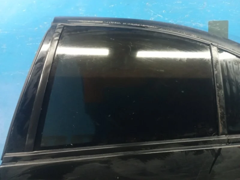 Стекло двери заднее левое Nissan Almera Classic