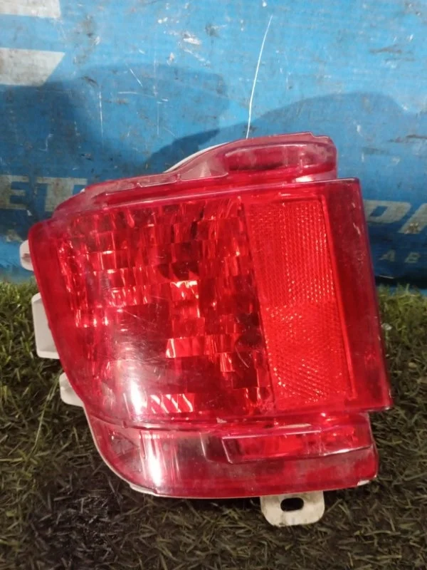 Фонарь в бампер задний левый Toyota Land Cruiser