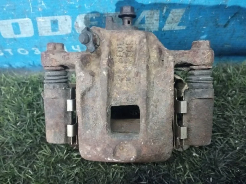 Суппорт тормозной задний правый Hyundai Santa Fe