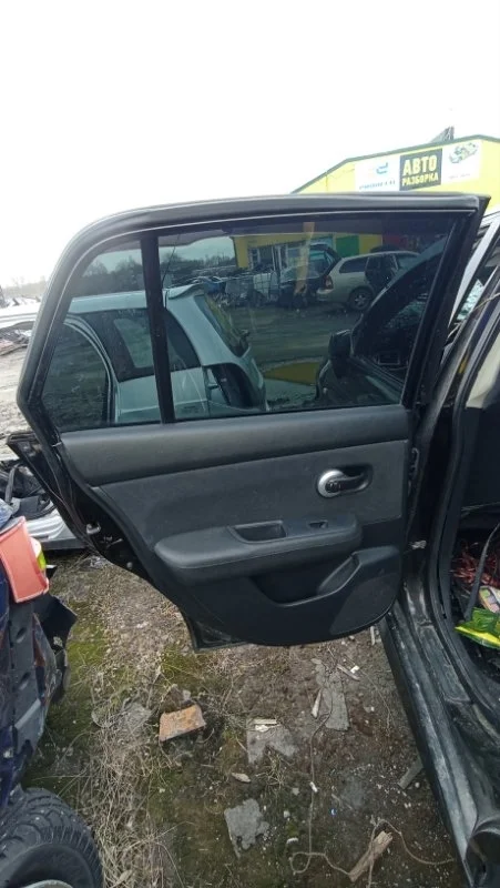 Моторчик стеклоподъемника задний левый Nissan